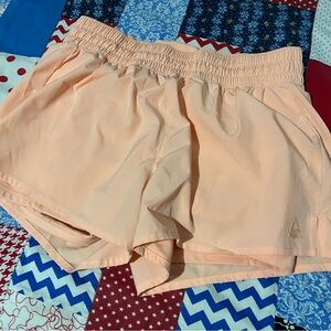 Reebok Women's Light Peach Athletic Shorts